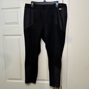 Black suede pants, snake textured embellishments